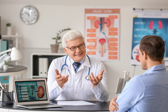 Young man visiting urologist in clinic